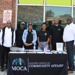 MOHS at a Community Resource Fair in front of Enoch Pratt Penn-North location