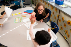 student with teacher