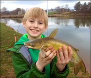 Photo of: Child with catfish