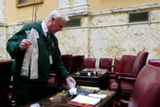 Photo of staff distributing tree seedlings in the General Assembly