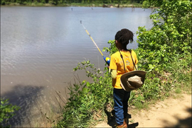 Photo of child fishing