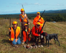 lady bird hunters with dog
