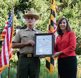 Photo of natural resources secretary with NRP superintendent