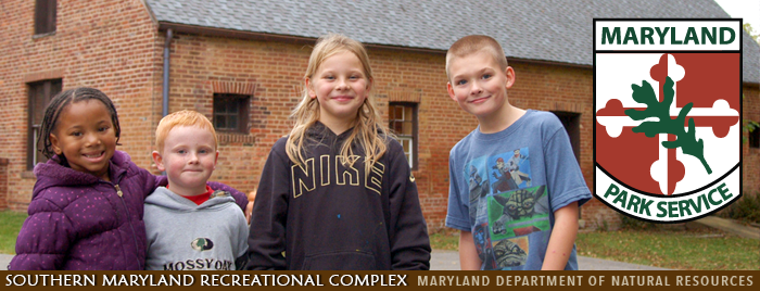 Header image of children visiting park