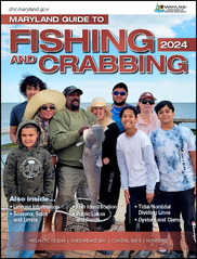 Fishing guide cover with several people around a fish that was caught