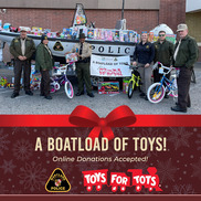 NRP Toys for Tots logo and photo of officers with toys on a boat