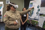 Woman with virtual reality glasses viewing a map