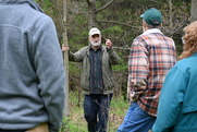 Man demonstrating his tree farm