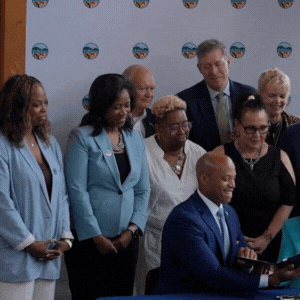 Gov Moore signing EJ EO