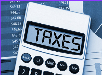 Image of calculator displaying the word taxes on the screen