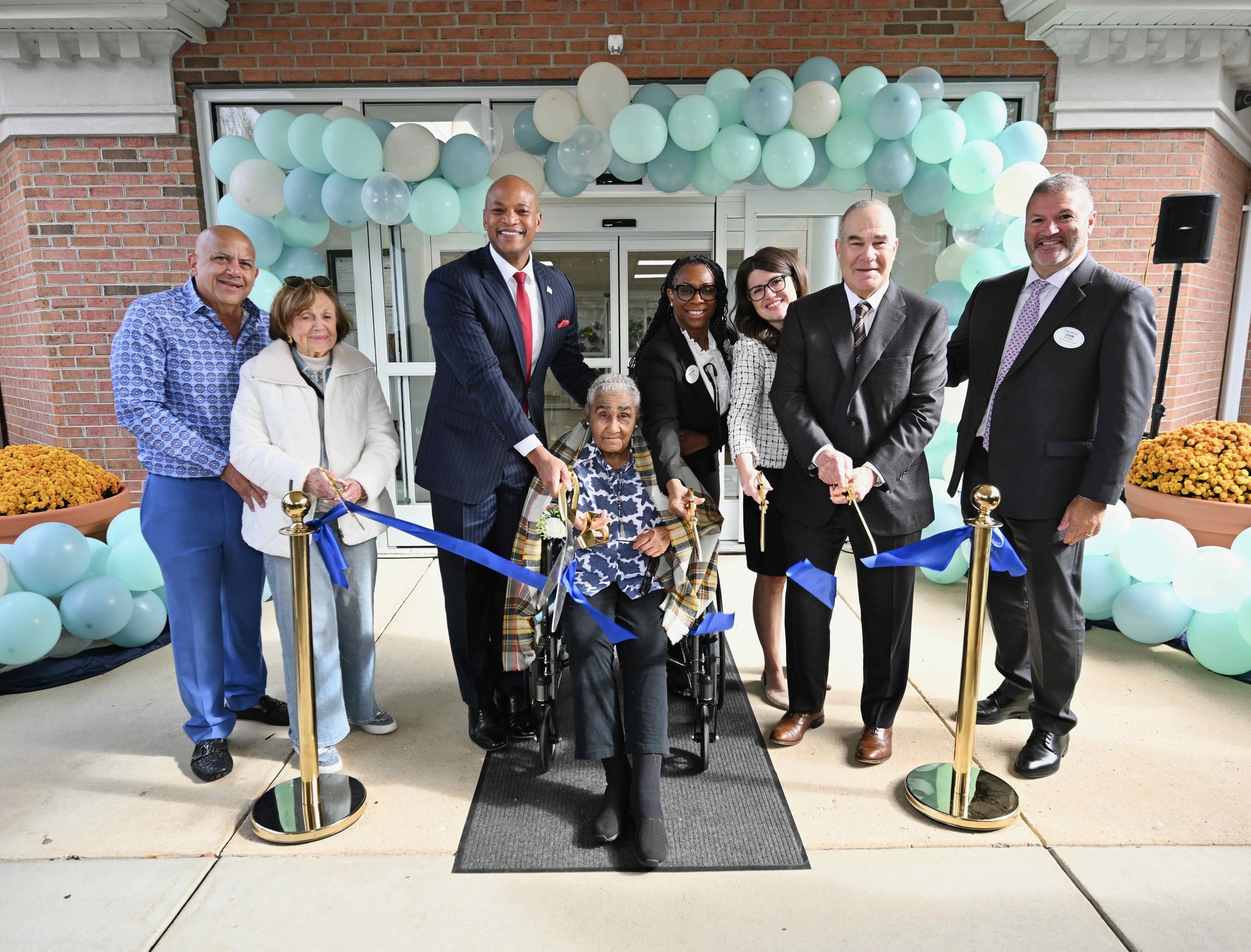Governor Moore and group cutting ribbon