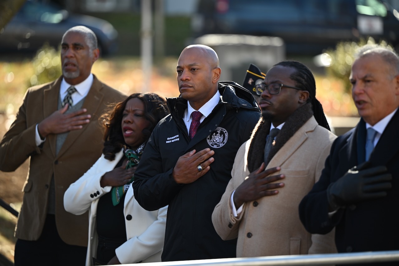 Governor Moore with hand over heart