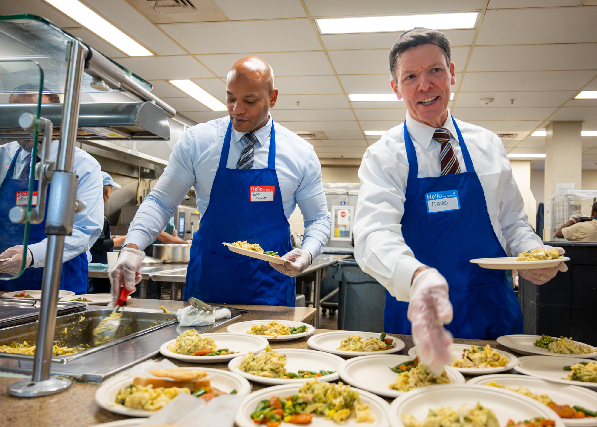 Governor Moore preparing food