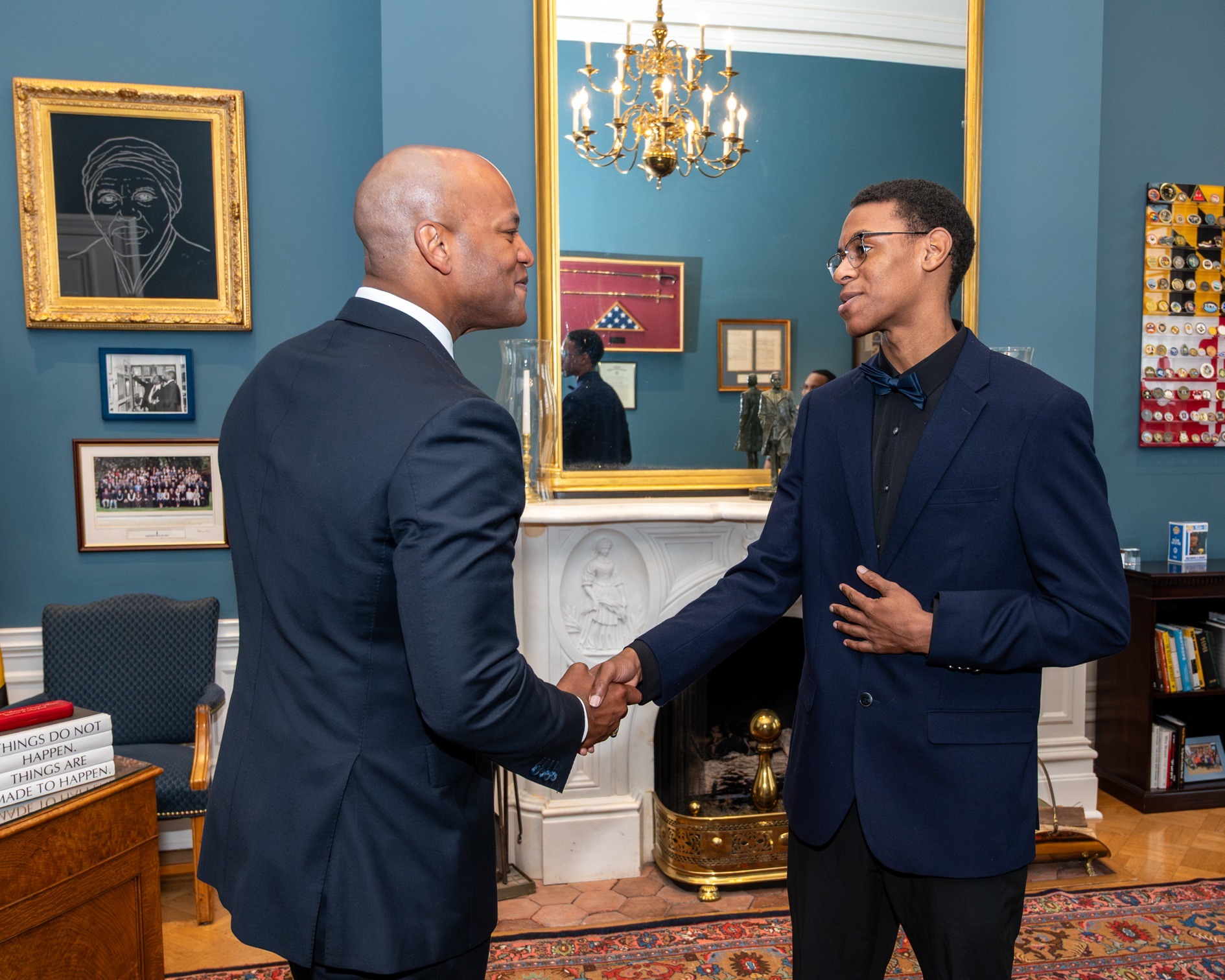 Governor Moore shaking hands