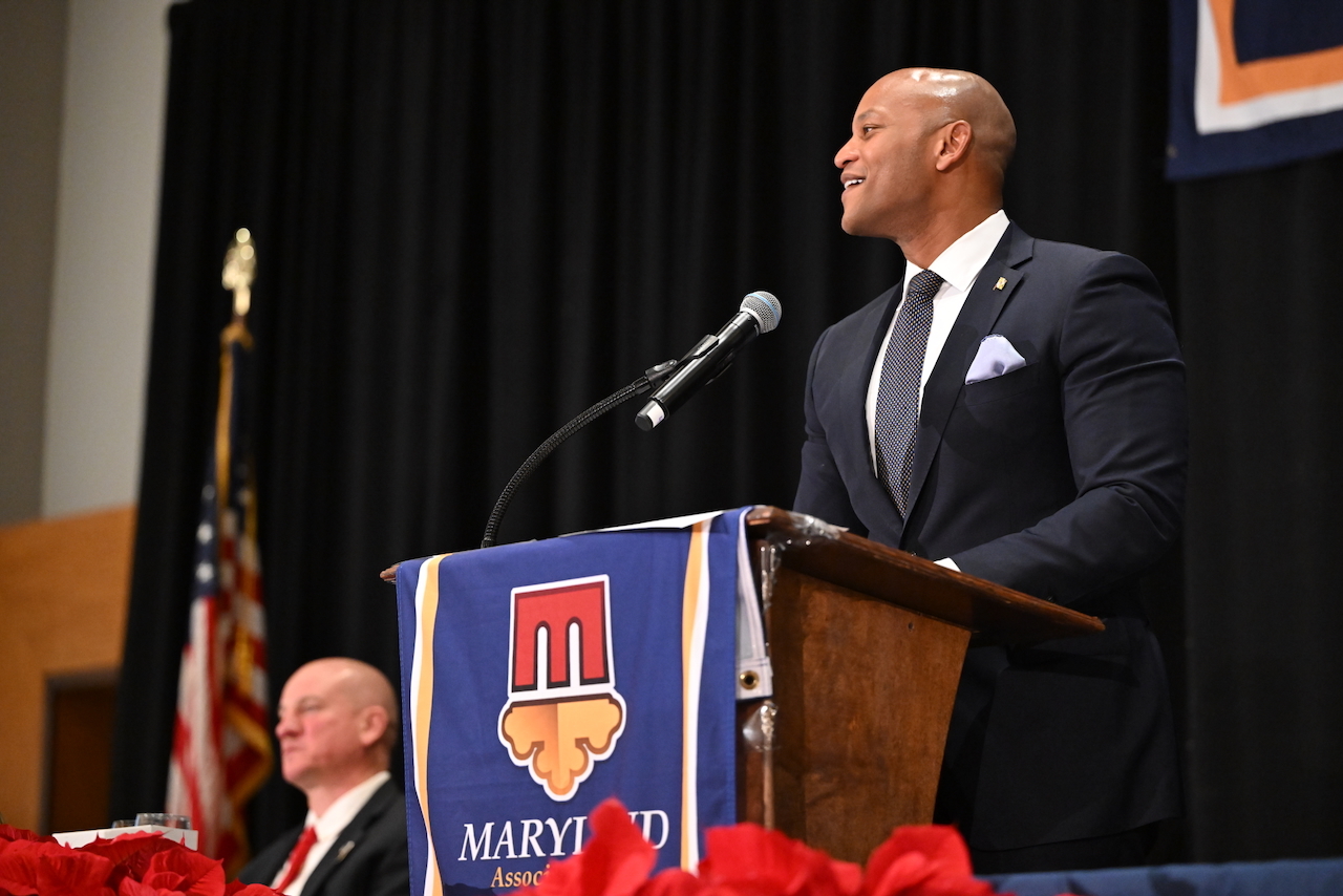Governor Moore speaking at lectern