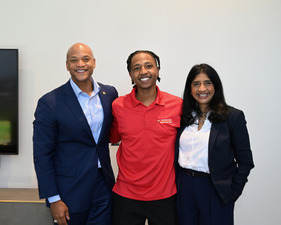 Governor Wes Moore and Lt. Governor Aruna Miller congratulate graduate of the Maryland Corps/Service Year Program.
