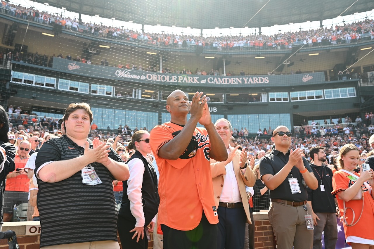 Governor Moore clapping at Orioles game