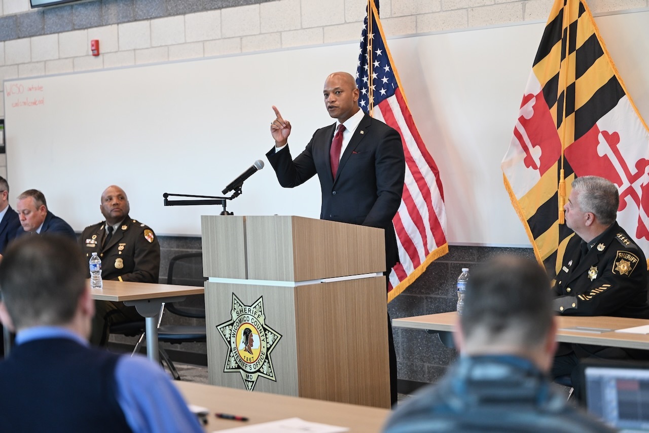 Governor Moore speaking at podium