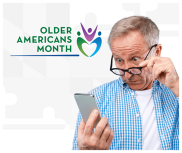 OAM - Older adult looking at phone in shock
