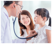 doctor listening to young girl's heartbeat