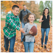 family playing with a football