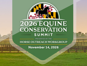 Silhouette of a horse and Maryland flag on a green background above a grassy pasture with wooden horse fencing.
