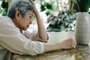 Picture of older adult who looks depressed