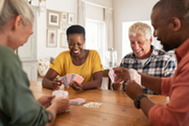 Older people playing cards