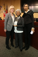 Nancy Floreen with Tina Clarke and another women in the County Council hearing room for Black History Month