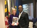 Nancy Floreen and Ike Leggett holding the  FY19 proposed operating budget