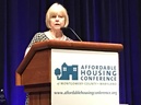 Nancy Floreen at a podium at the 2018 Affordable Housing Conference at North Bethesda Marriott