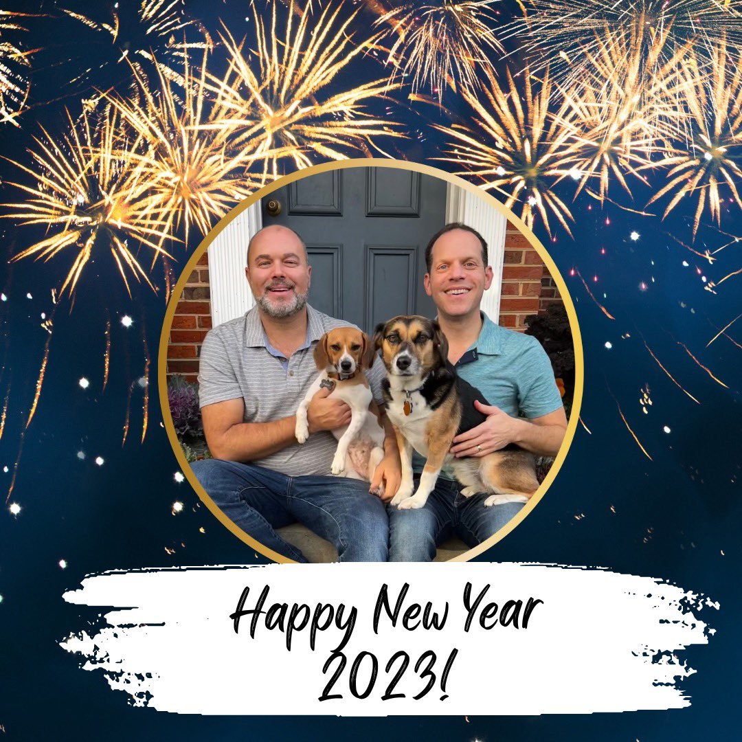 Council President Glass and husband Jason outside of their home with their two dogs. Banner message reads “Happy New Year 2023!”