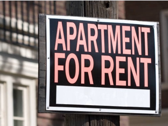 Apartment for rent sign.