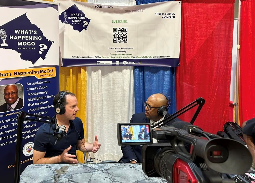 Council President Glass and host Derrick Kenny record the What's Happening MoCo podcast live in Ocean City.