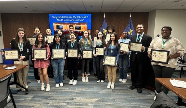 Students in the Fall 2023 Cohort with certificates and medals