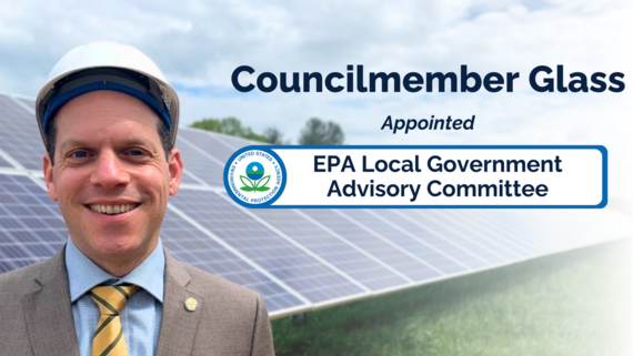 Councilmember Glass in front of solar panels with text saying "Councilmember Glass Appointed: EPA Local Government Advisory Committee"