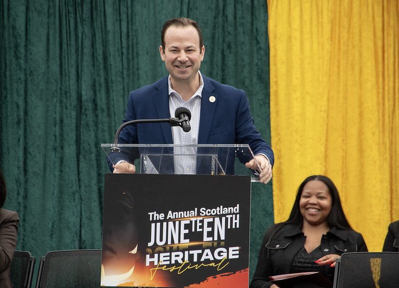 Council President Friedson speaks at the preview for the Scotland Juneteenth Heritage Festival.