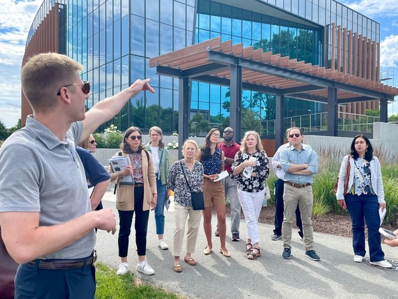 A photo of Councilmembers and staff outside a science building