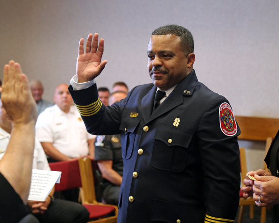 Corey Smedley being sworn in as Fire Chief