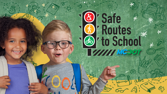 A banner from MCDOT featuring two kids and the words "Safe Routes To Schools"