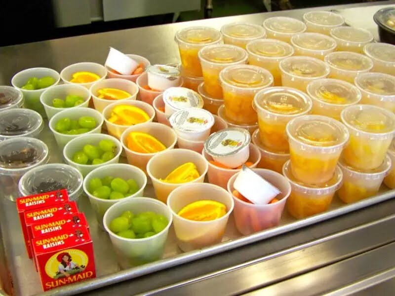 A picture of fruit cups and other healthy items served at lunch