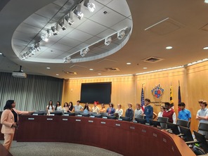 Taking students on a tour of the 3rd-floor public hearing room of the Council Office Building