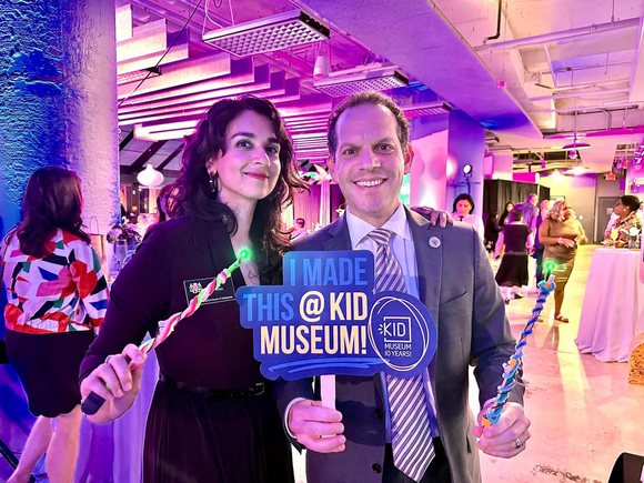 A photo of Councilmember Glass and Delegate Sarah Wolek at the KID Museum 10th anniversary celebration