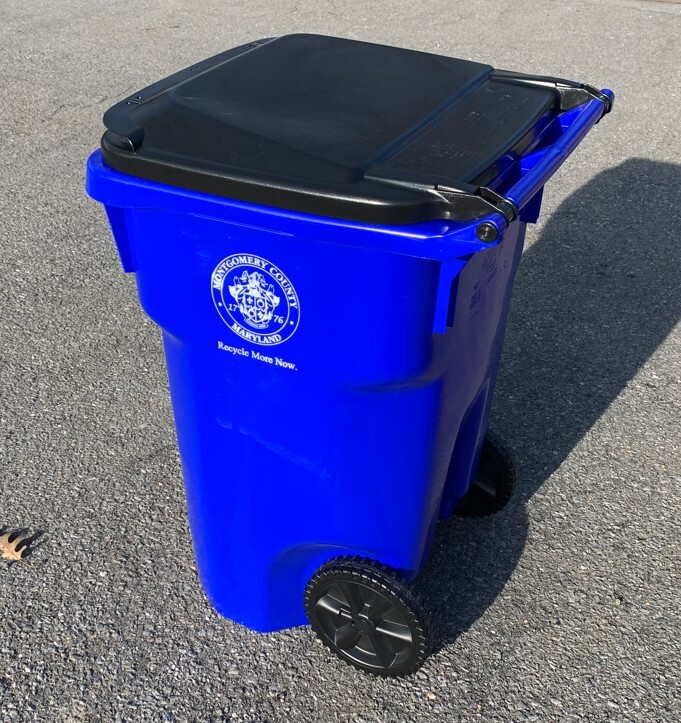 A photo of a wheeled recycling cart