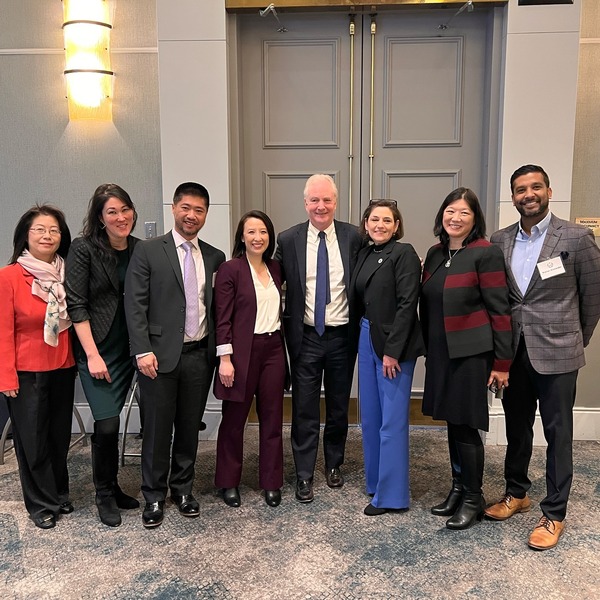 Council President Stewart and Senator Van Hollen with community leaders at the Minority Legislative Breakfast.