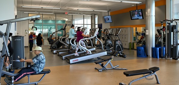 People walking on treadmills and using gym equipment. Credit: Montgomery Recreation.