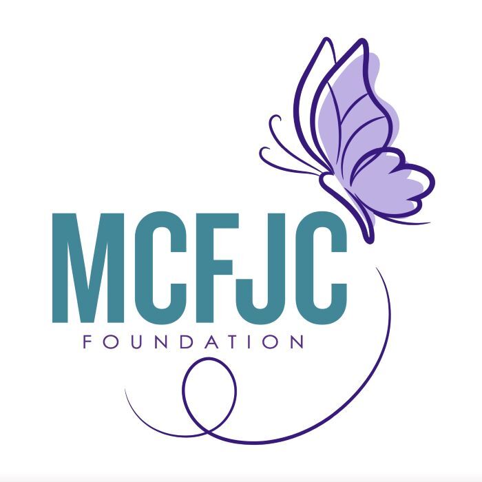 Family Justice Center (MCFJC) logo with blue letters and a purple butterfly.