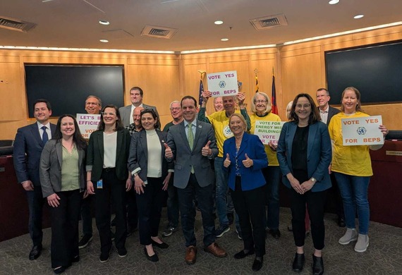 Councilmember Glass with Transportation & Environment Committee members and environmental advocates celebrating the passage of BEPS
