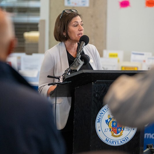Council President Stewart speaks at the United in Service and Support Resource Fair to support federal workers and those impacted by federal actions.