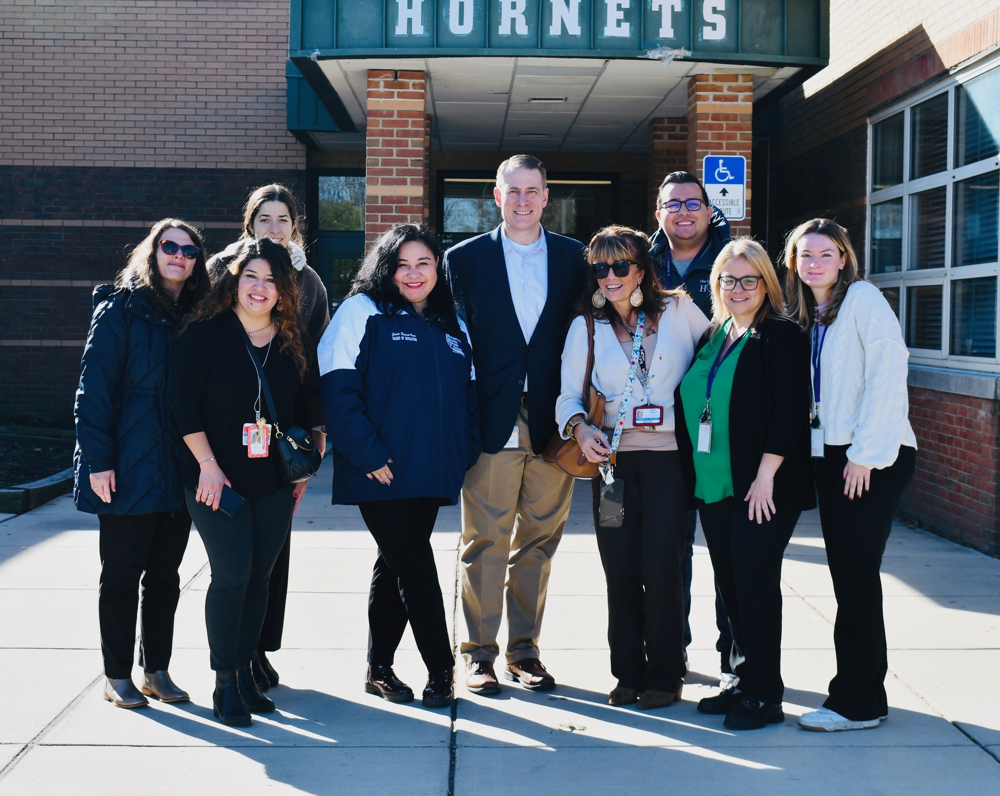 Photo of Damascus HS, UpCounty Hub, Superintendent, and MoCo Food Council staff in front of Damascus HS during visit in November 2024 Photo of Damascus HS, UpCounty Hub, Superintendent, and MoCo Food Council staff in front of Damascus HS during visit in November 2024